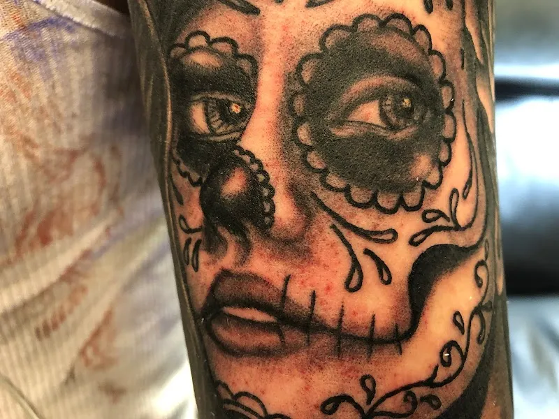 The Shop Tattoo & Comics