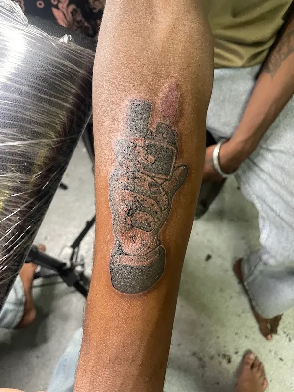 Burning needle tattoo studio