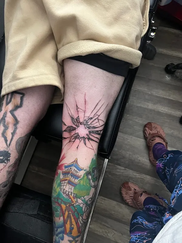 Ape Warfare Tattoos and Piercings