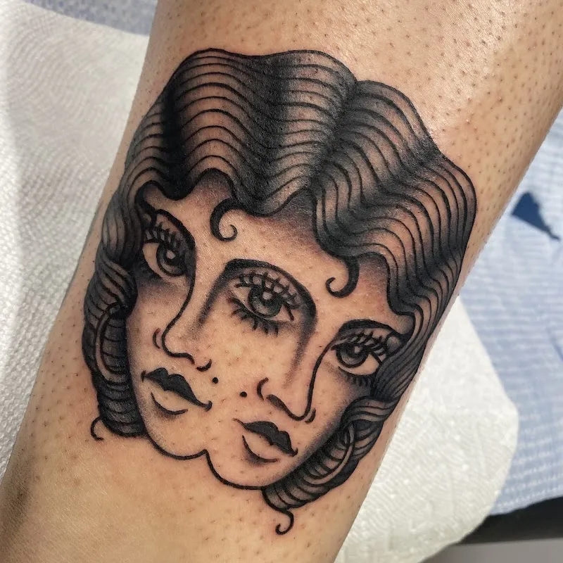 NO IDOLS TATTOO & PIERCING