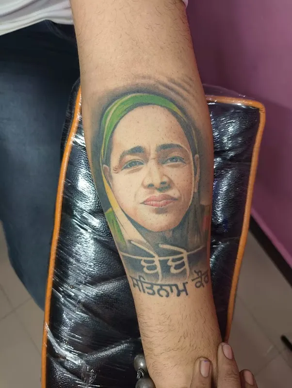 AJ Tattoo