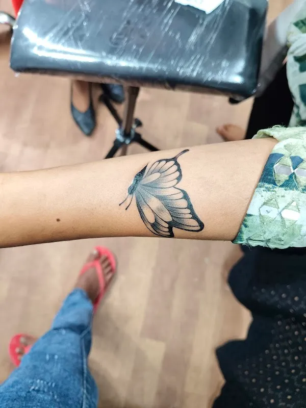 Sang’s tattoo and piercing