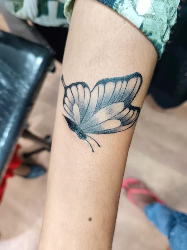 Sang’s tattoo and piercing