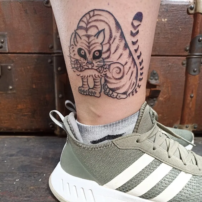 Tchiiiz Tattoo