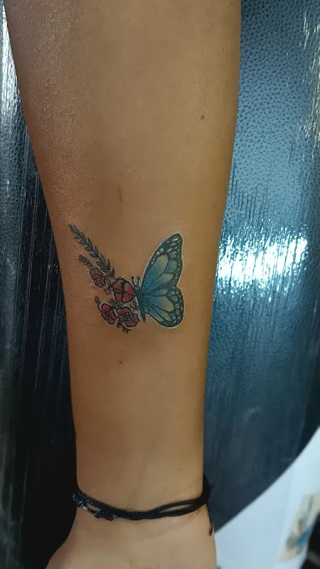 Tattoo Den , Tattoo Removal & Piercing Studio