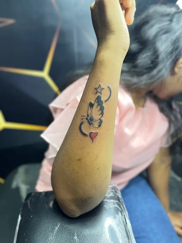 Tattoo Den , Tattoo Removal & Piercing Studio