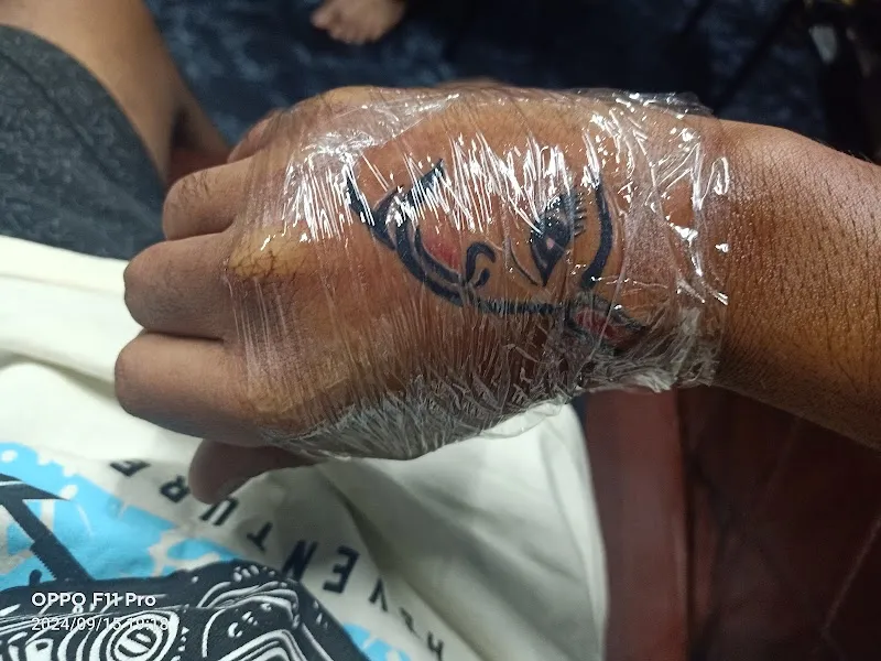 Tattoo Den , Tattoo Removal & Piercing Studio