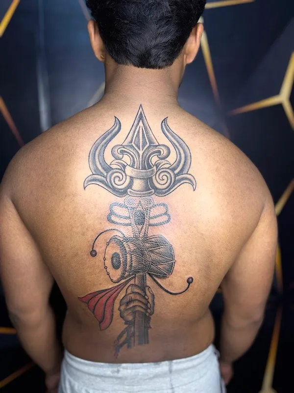Tattoo Den , Tattoo Removal & Piercing Studio