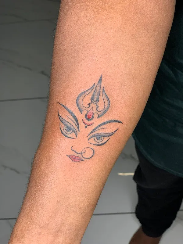 Peafowl Tattoo Studio