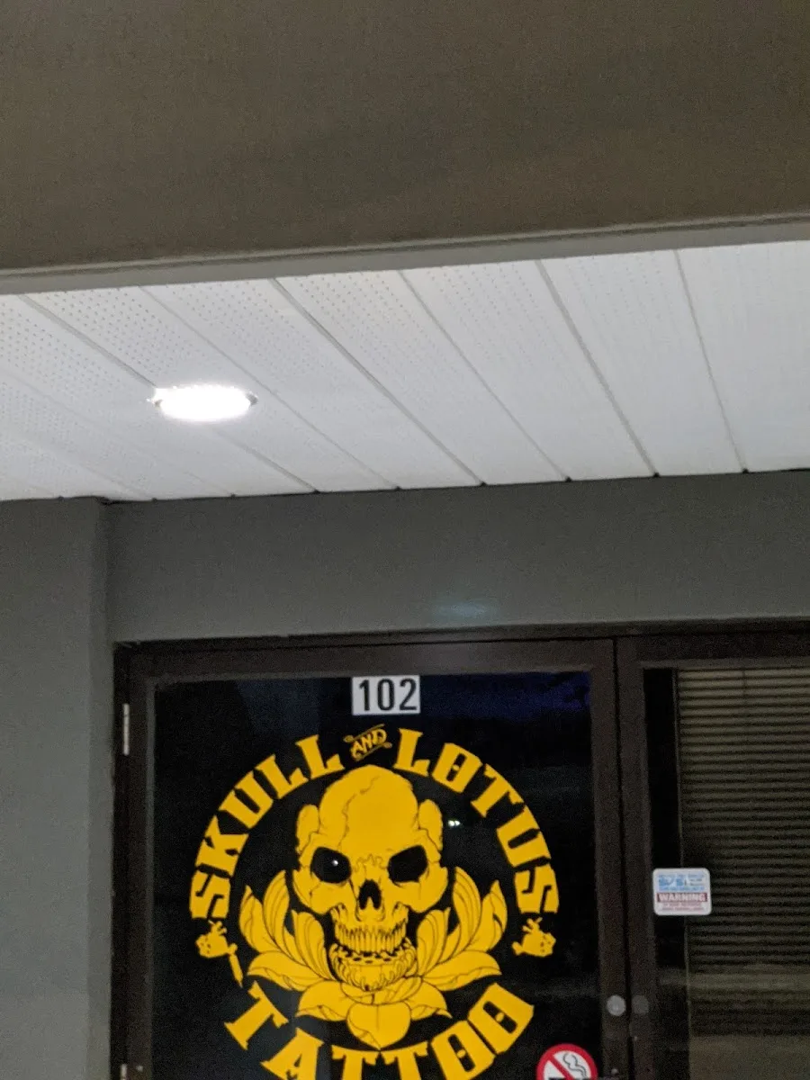 Skull and Lotus Tattoo