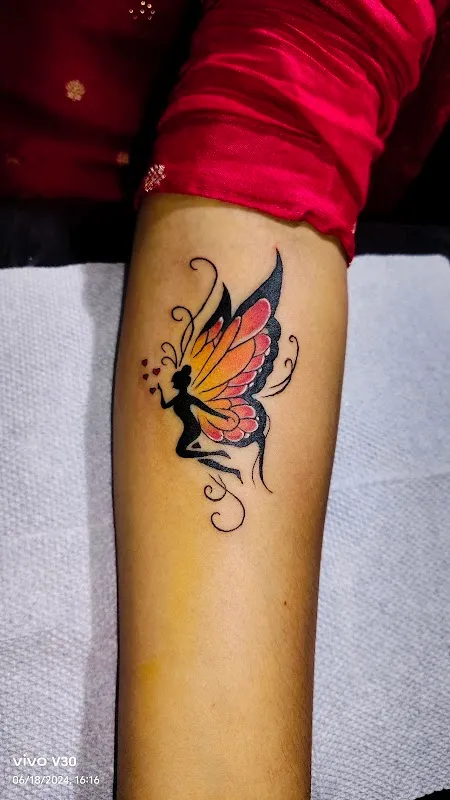 Royal wings tattoo