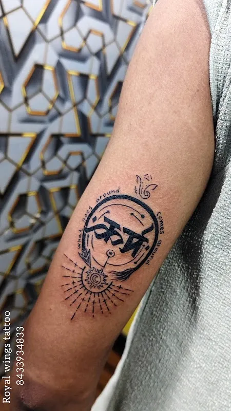 Royal wings tattoo
