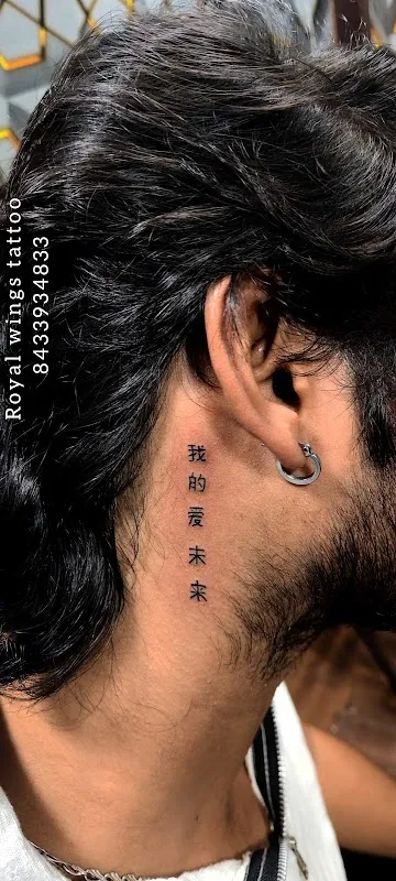 Royal wings tattoo