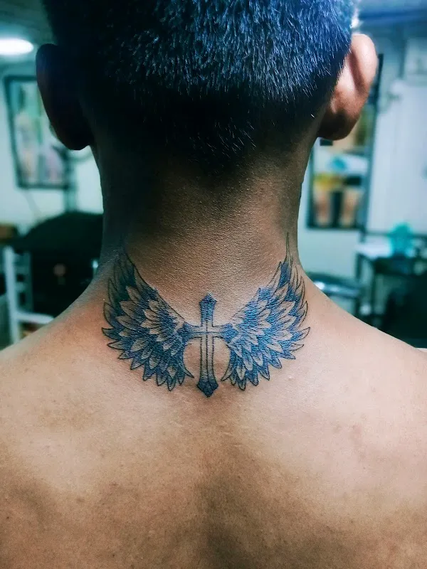 Royal wings tattoo
