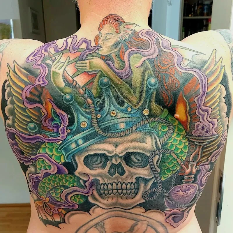 Happy Needles Tattoo