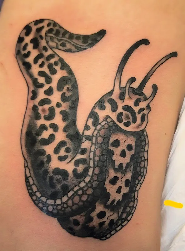 Hand of Glory Tattoo & Piercing