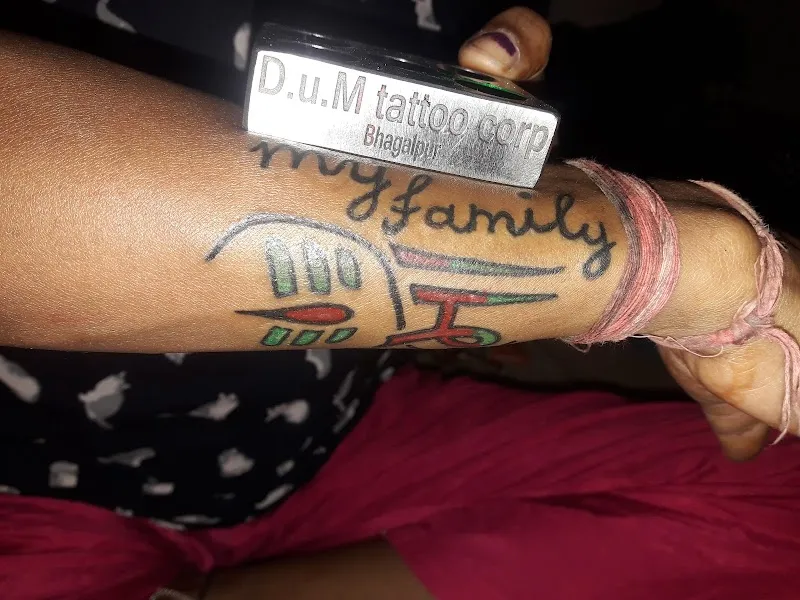 D U M Tattoo Corporation