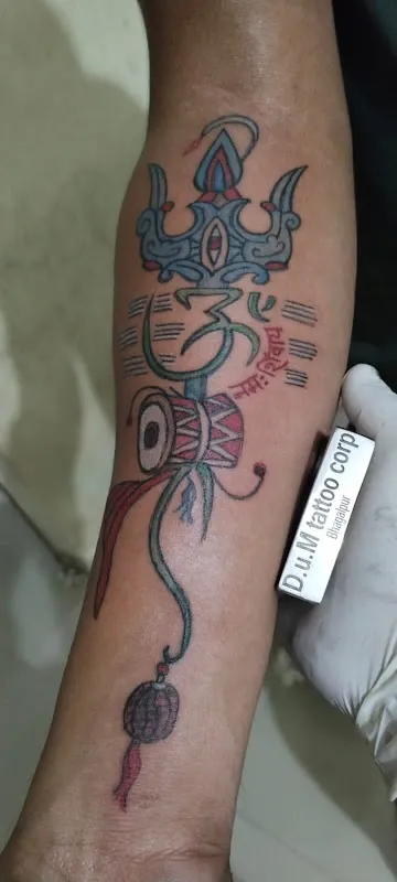 D U M Tattoo Corporation
