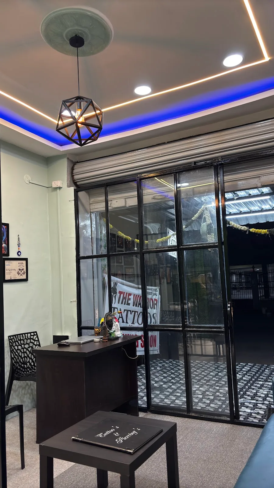 The warrior tattoos & piercing studio