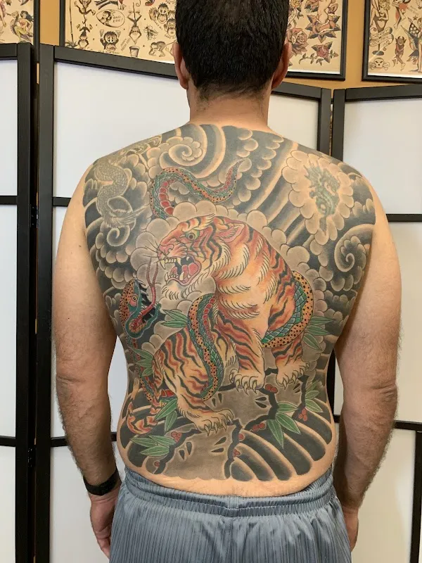 Permanent Vacation Tattoo