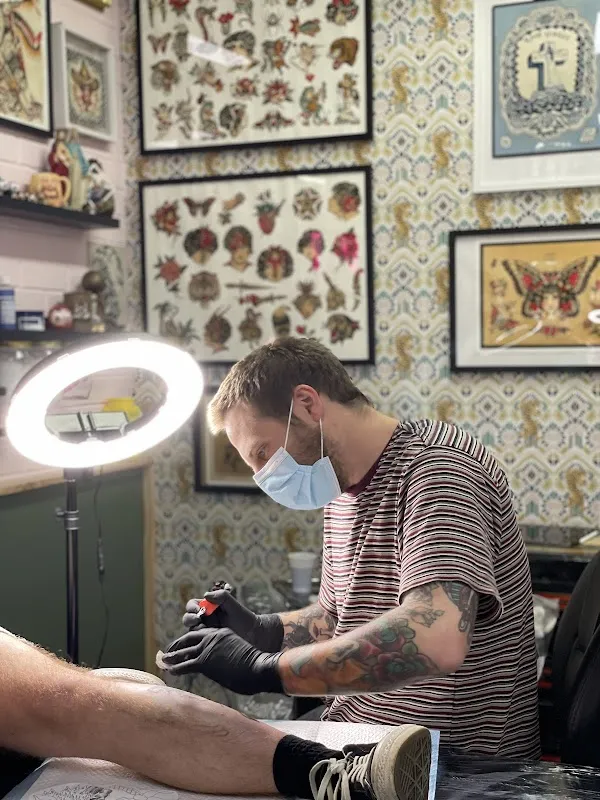 Hen's Teeth Tattoo Co.