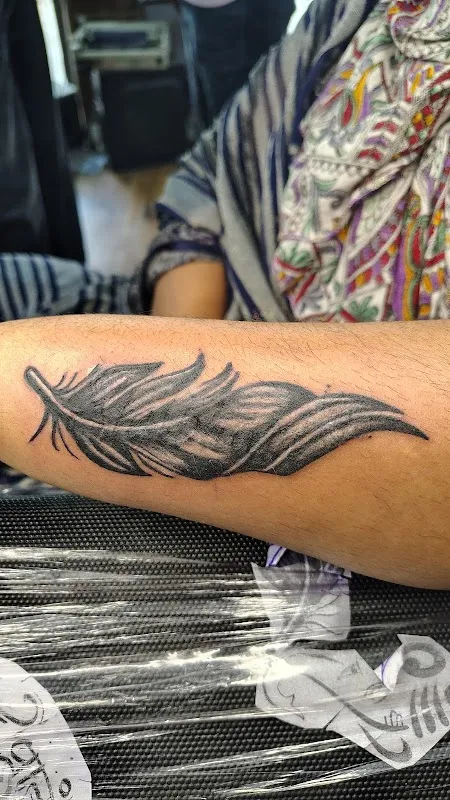Dj Tattoo and salon