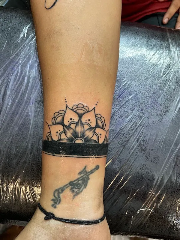 Needle Mantra Tattoo & Piercings