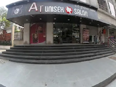 AT UNISEX SALON