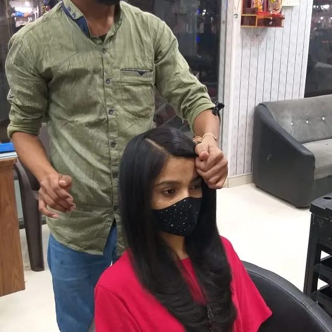 AT UNISEX SALON