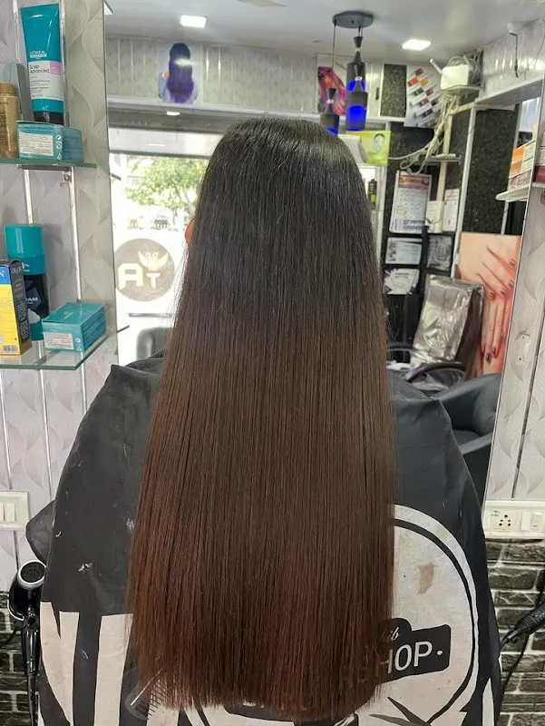 AT UNISEX SALON