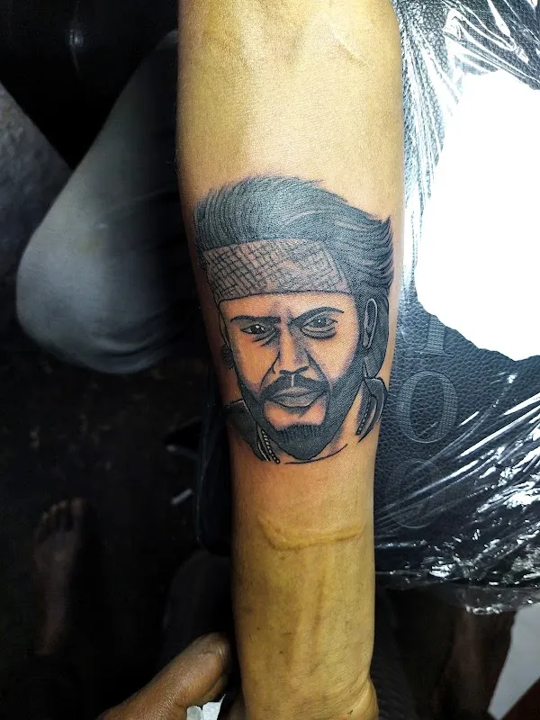 A J Tattoo World Studio