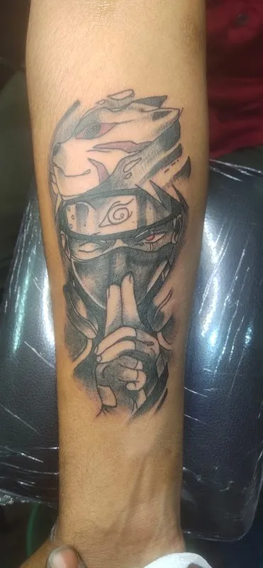 A J Tattoo World Studio