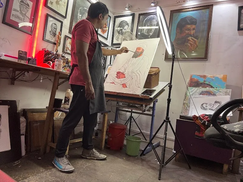 Sketch Artist With Portrait Painting