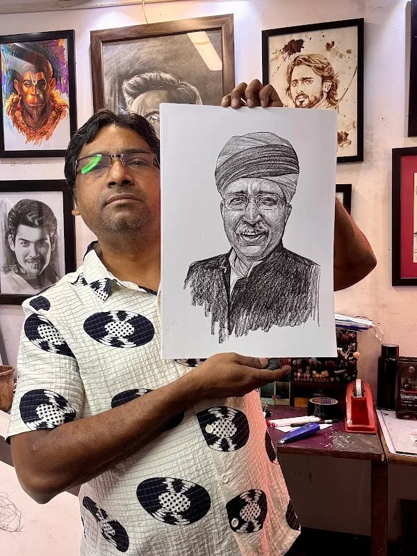 Sketch Artist With Portrait Painting