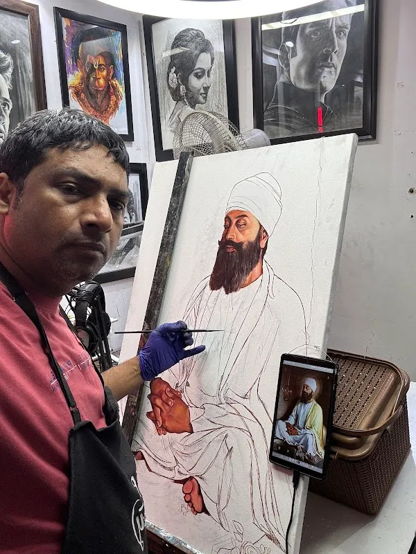 Sketch Artist With Portrait Painting