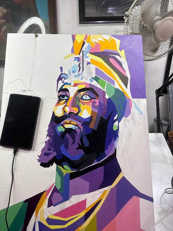 Sketch Artist With Portrait Painting