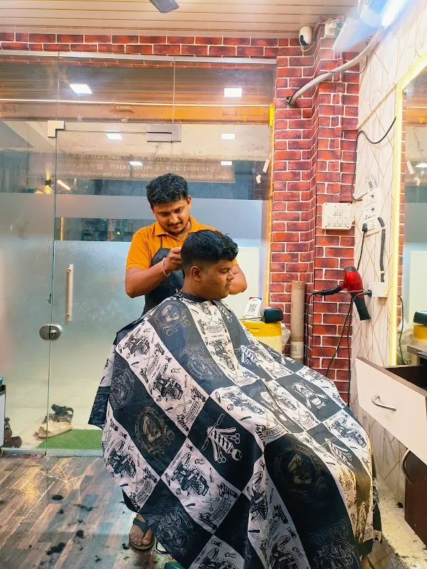 SHARP SCISSORS THE FAMILY UNISEX SALON