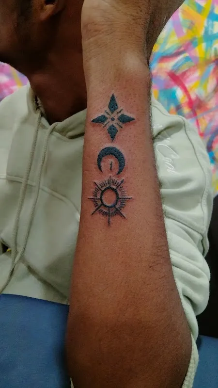 Magicians unisex salon and Tattoos
