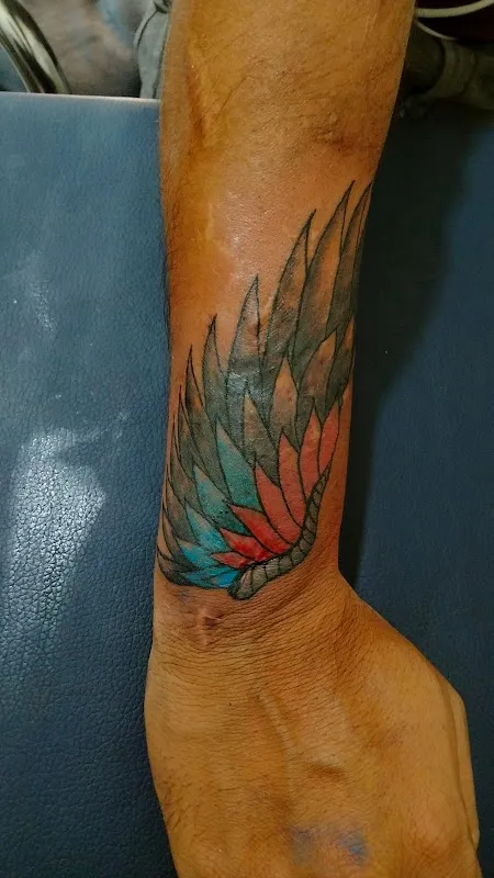Magicians unisex salon and Tattoos
