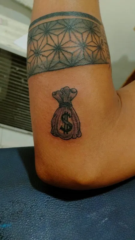 Magicians unisex salon and Tattoos